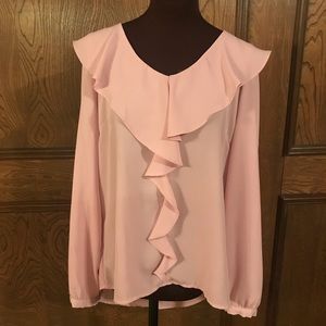 Pink ruffle-collared blouse